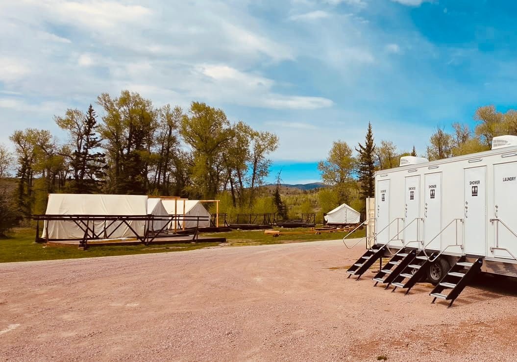 Base camp showers set up for a crew at a remote Utah staging area